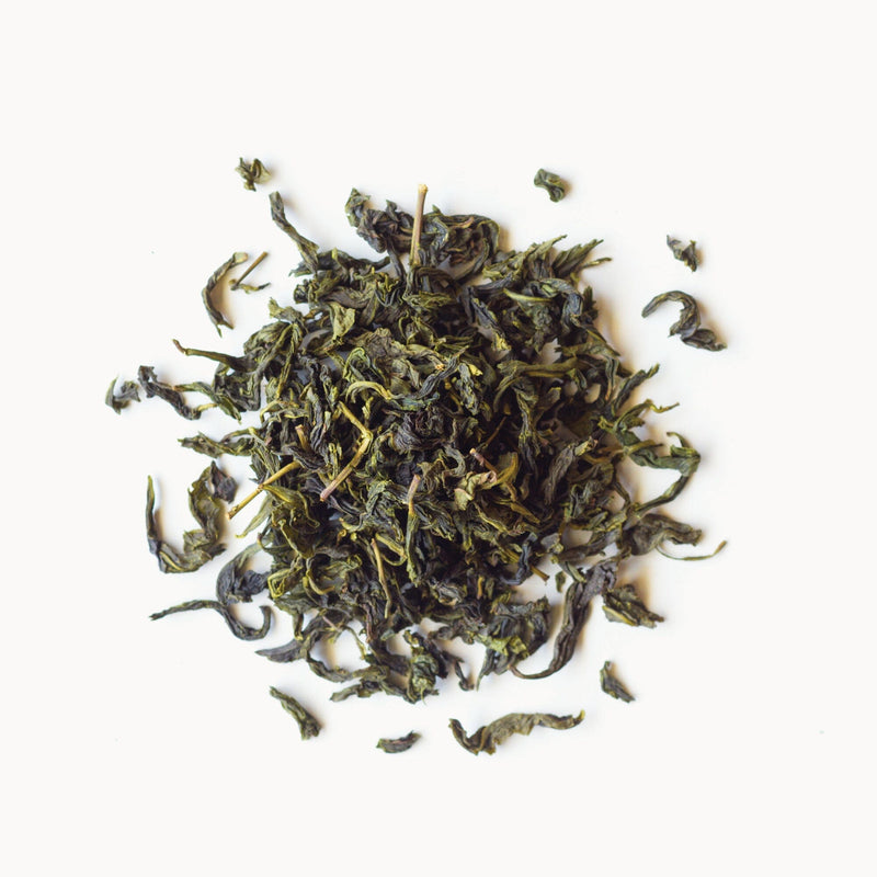 A pile of Earl Green tea from Rishi Tea & Botanicals on a white background.