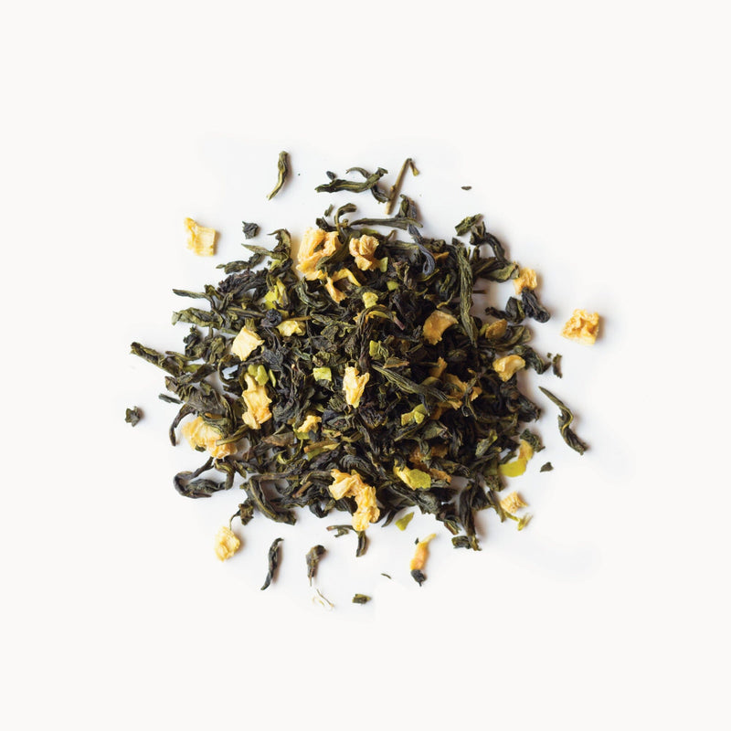 A pile of Tropical Coconut tea by Rishi Tea & Botanicals on a white background.