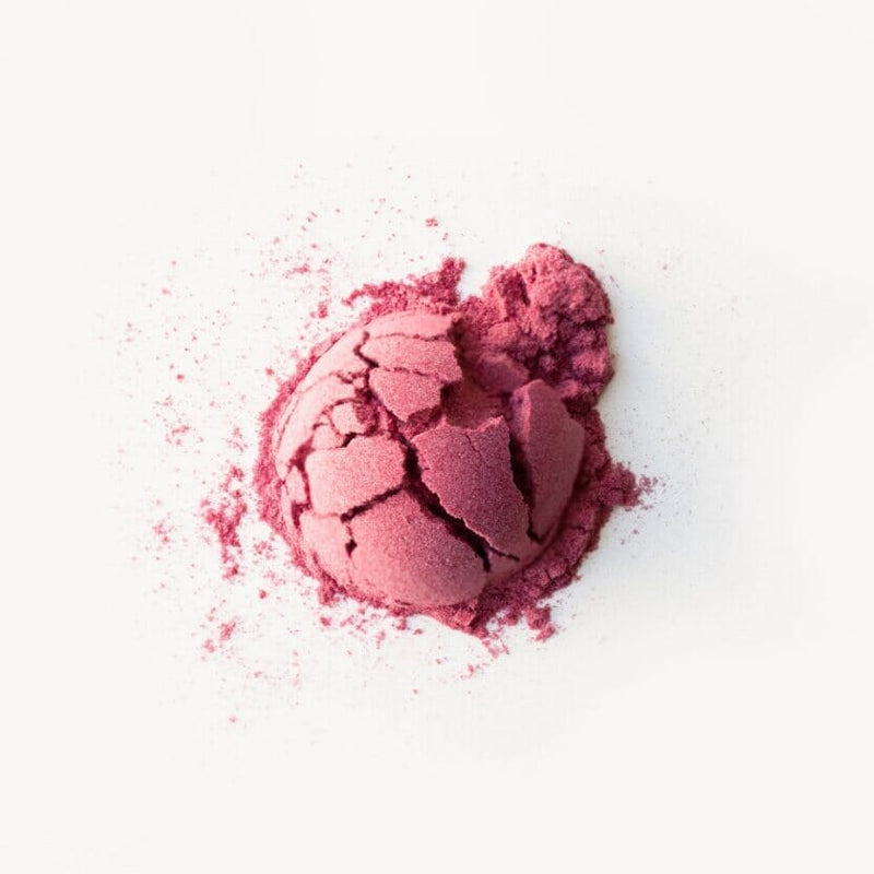 A Hibiscus Limeade Powder from Rishi Tea & Botanicals on a white background.