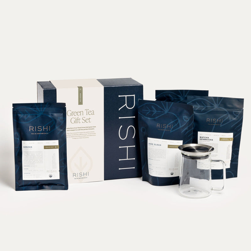 A Green Tea Gift Set from Rishi Tea & Botanicals with a bag of coffee and a mug.