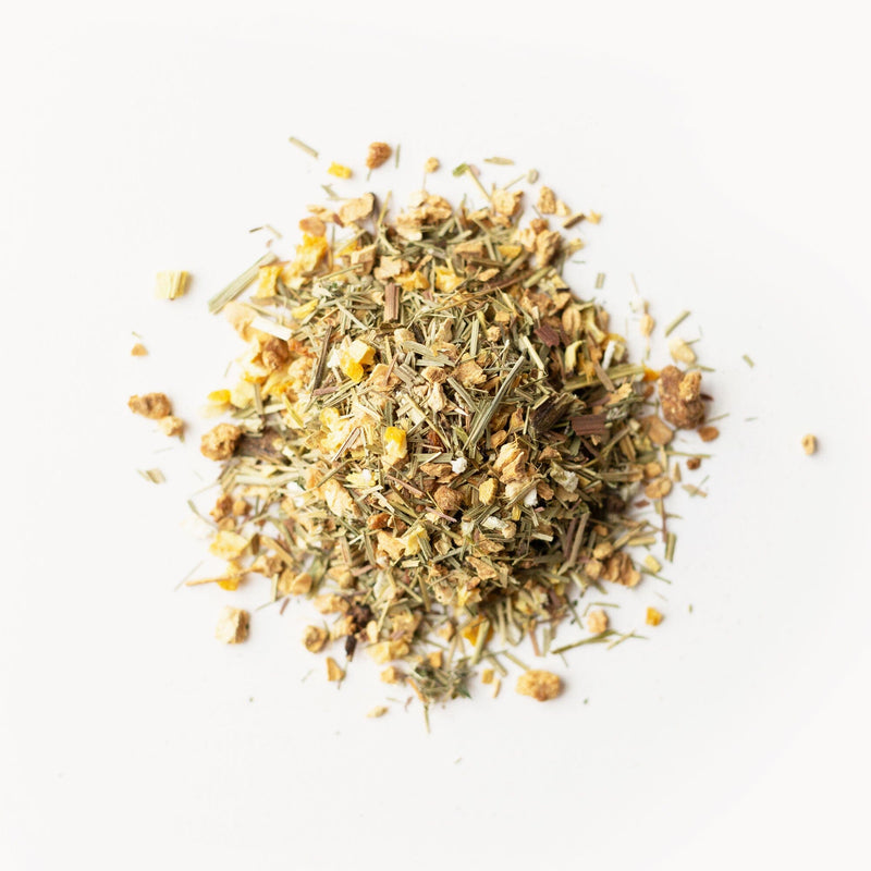 A pile of Rishi Tea & Botanicals Artemisia Ginger on a white background.
