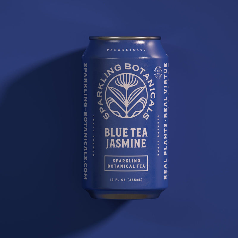 A can of Blue Tea Jasmine from Rishi Tea & Botanicals on a blue background.