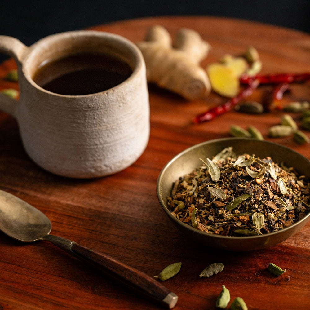 Vintage blue pot of traditional indian masala chai tea with
