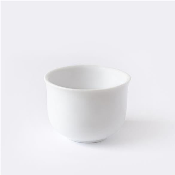 A White Gongfu Teacup by Rishi Tea & Botanicals on a white background.