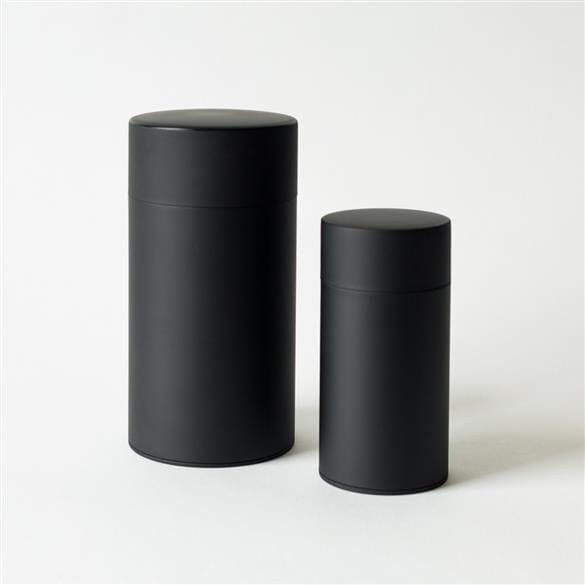 Two Kotodo Tin canisters on a white surface with specified dimensions.
